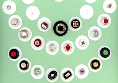 A card of division one and three inlay glass buttons