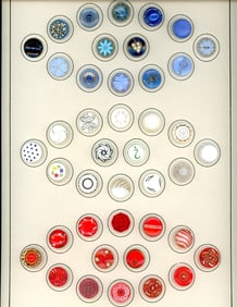 A card of division three glass buttons.