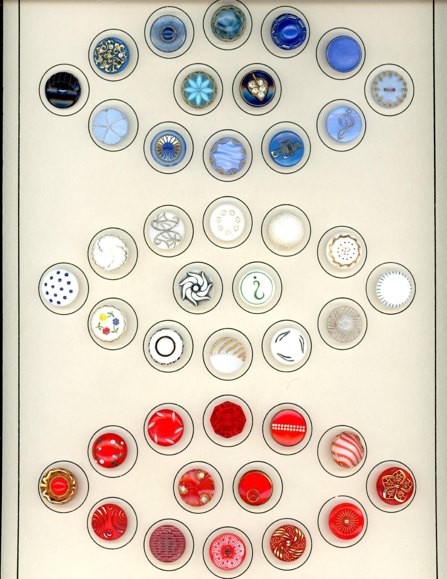 A card of division three glass buttons. (1 of 4)