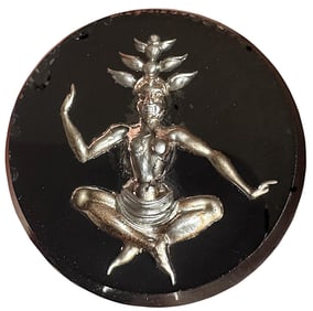 A division three figural glass button