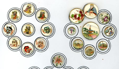 A partial card of division three Satsuma buttons
