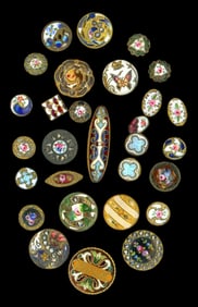 A card of assorted division one enamel buttons