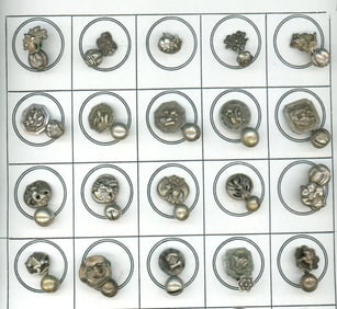A partial card of division one silver toggle buttons