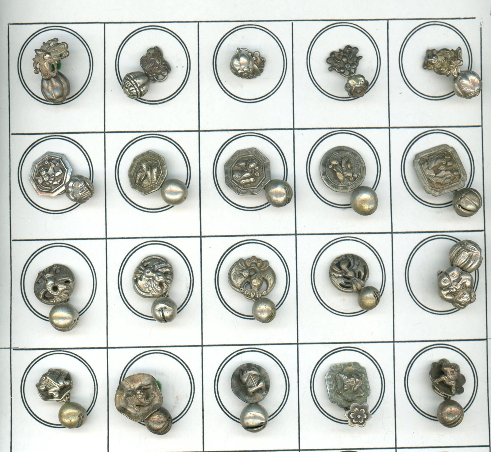 A partial card of division one silver toggle buttons (1 of 3)