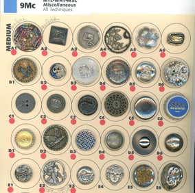 A card of division 1 & 3 assorted white metal buttons