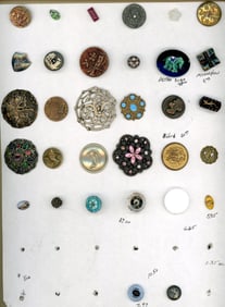 A card of division one and three assorted buttons
