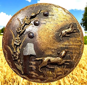 A division one brass button with dogs