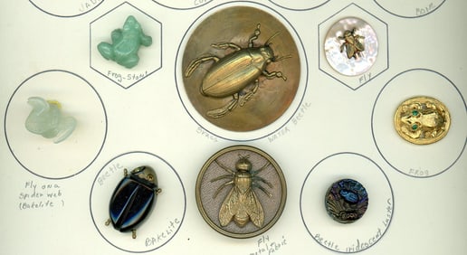 A partial card of div. 1 & 3 assorted material buttons