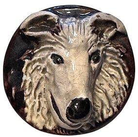 A division three molded dog button