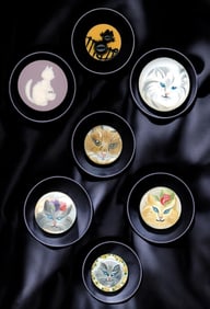 A small card of feline CAT buttons