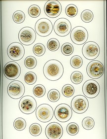 A card of division three glass buttons.