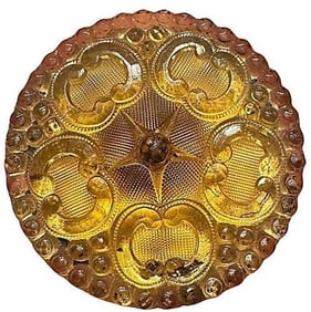 A division one lacy glass button