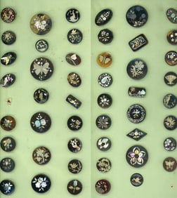 A selection of division one assorted inlay buttons