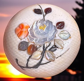 A division one natural material inlay button