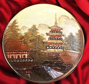 A detailed division one Satsuma button
