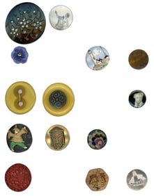 A partial card of Div. 1 & 3 assorted material buttons