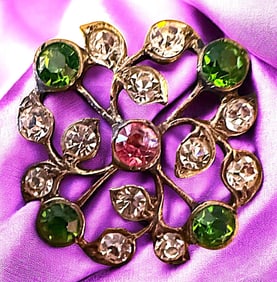 A division one colorful pierced jeweled button