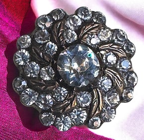A division one black dot paste button