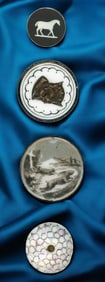 A small card of division one ceramic buttons