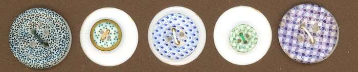 A small card of division one china buttons