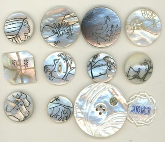 A small card of assorted pearl buttons