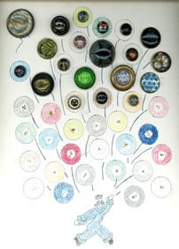 A partial card of division one glass in metal buttons