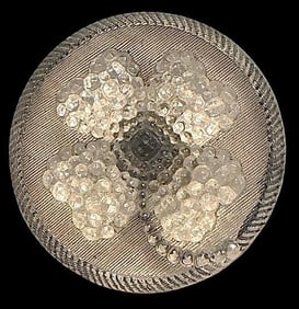 A division one lacy glass button