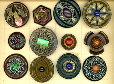 A partial card of division three Bakelite buttons