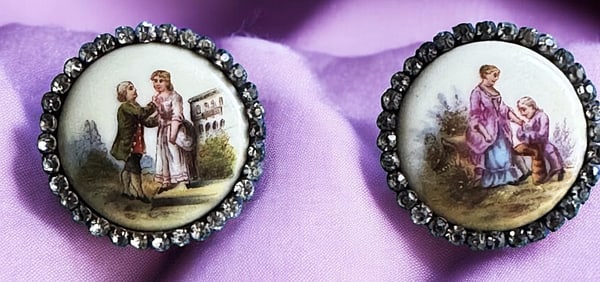 A pair of division one pictorial porcelain buttons