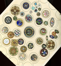A card of division one assorted enamel buttons