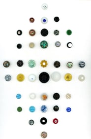 A card of division one Charmstring glass buttons