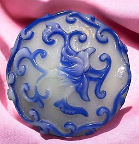 A division three hand crafted glass button