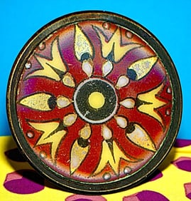 An unusual division one porcelain in metal button