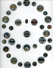 A card of assorted division one tole buttons