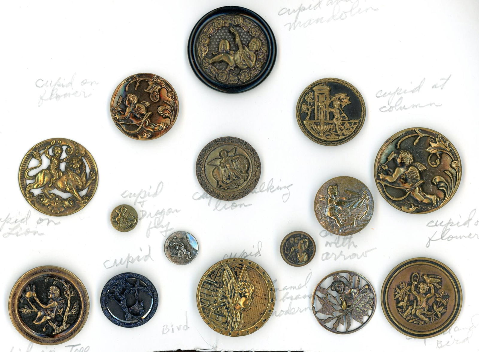 A small card of division 1 Cupid/Cherub/Gnome buttons (1 of 4)