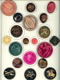 A card of division three colorful celluloid buttons