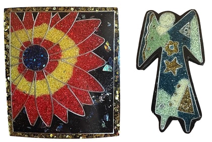 A small card of division three studio artist buttons