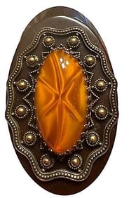 A division three Bakelite and glass button