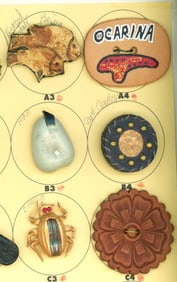 A partial card of division three leather buttons