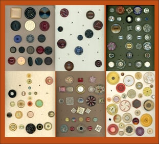 A box lot of assorted plastic carded buttons