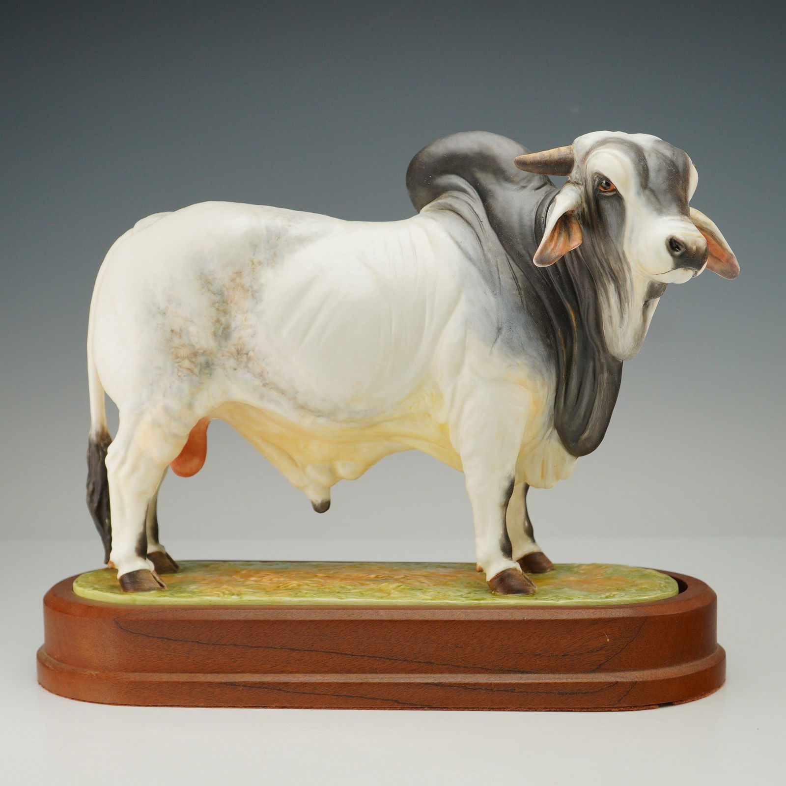 Royal Worcester Figurine, Brahman Bull: A finely detailed Royal Worcester bone china figurine depicting a Brahman Bull, modelled by acclaimed sculptor Doris Lindner. Issued in 1968, this exceptional figure showcases the bull standing proudl