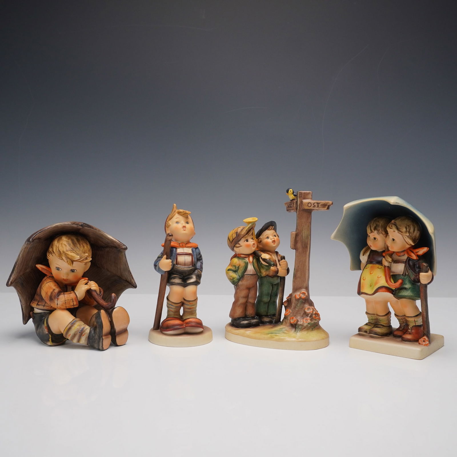 4pc Hummel Figurines Crossroads, Little Hiker, Stormy Weather, Umbrella Boy (1 of 3)