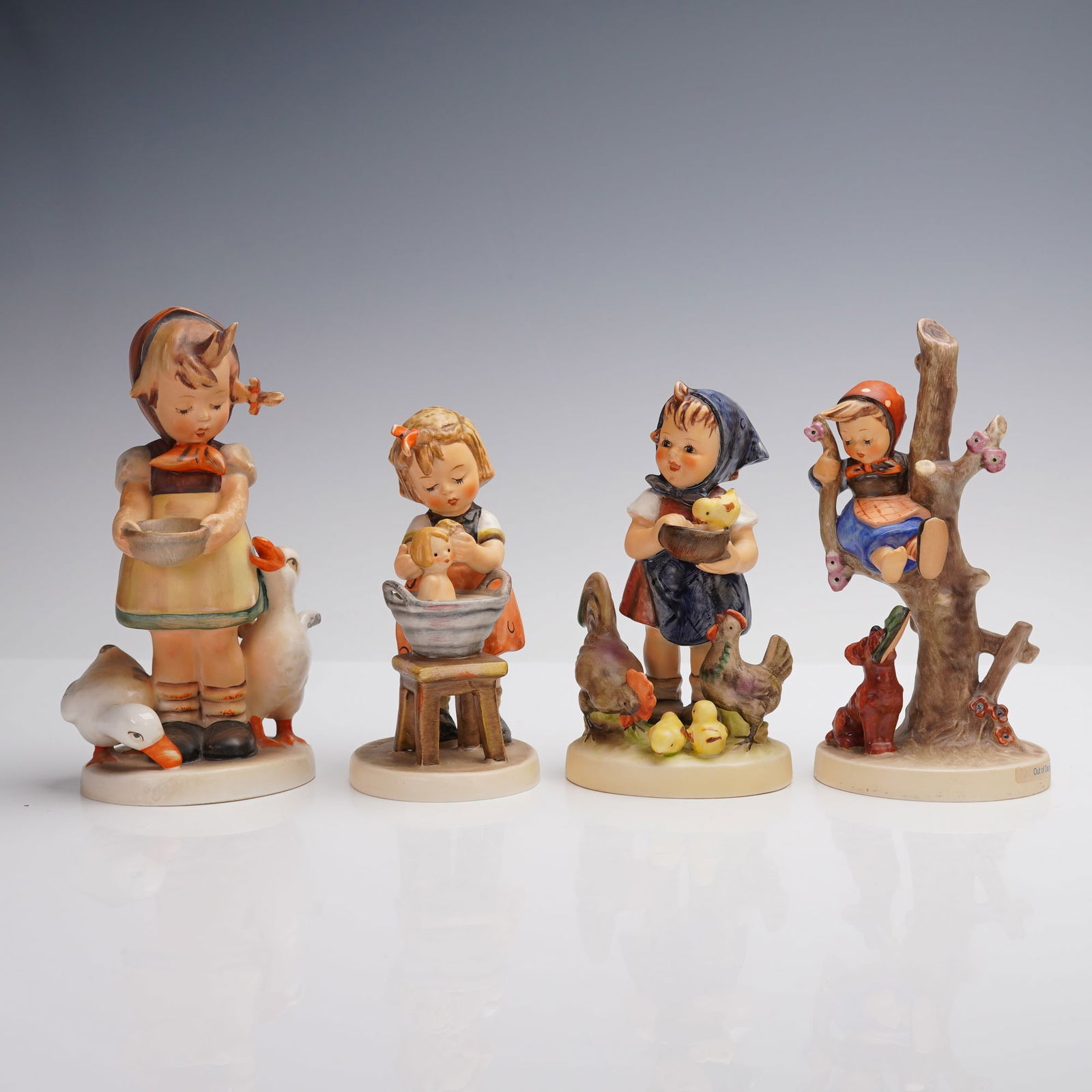 4pc Goebel Hummel Girlhood Figurines, Out of Danger, Doll Bath, and More: Marked with Goebel W. Germany back stamps and incised M.I. Hummel signatures. This charming group includes "Be Patient" #197, depicting a young girl with two geese by her side, "Doll Bath" #319, showi