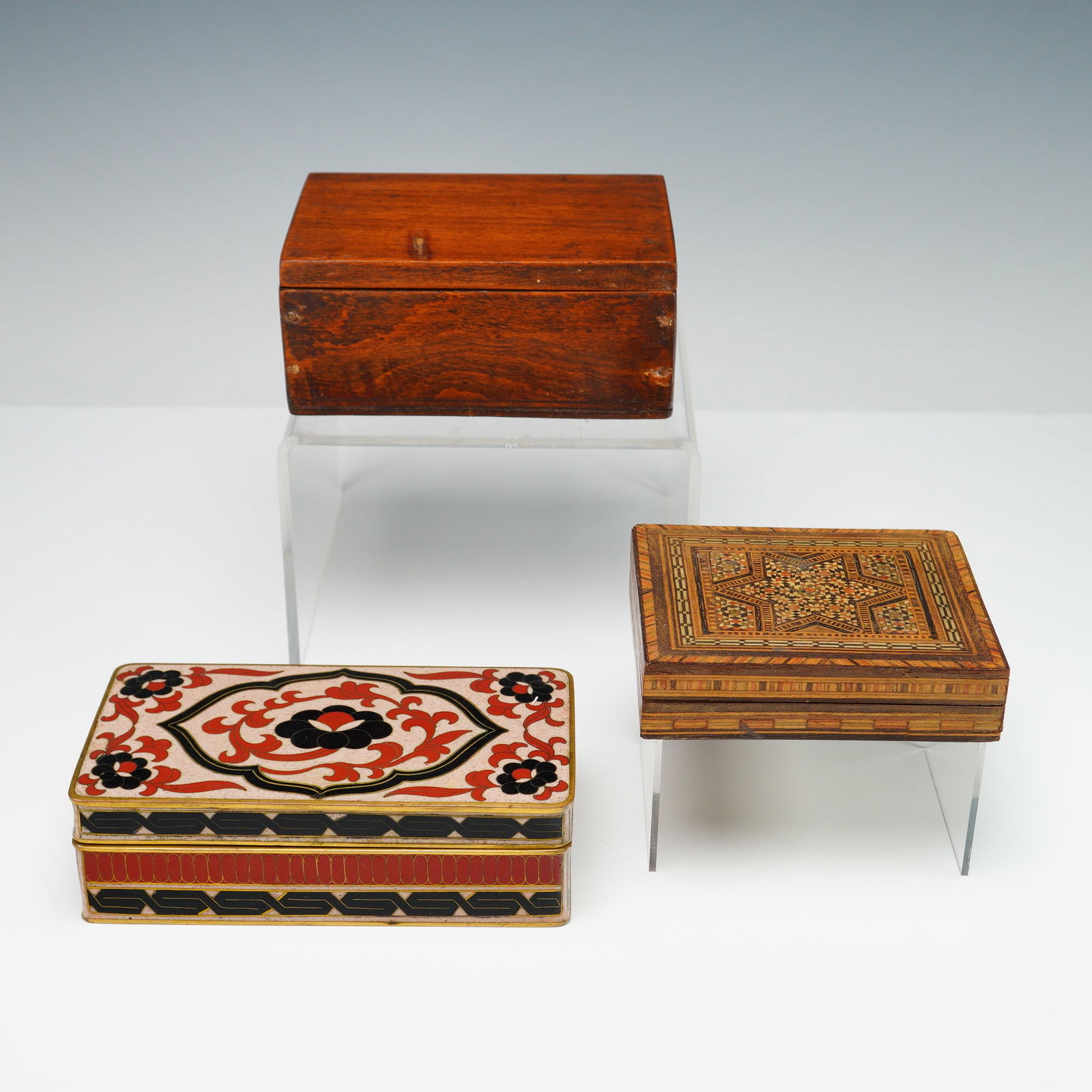 3pc Inlaid Wood, Enameled Metal, and Plain Wooden Boxes: Decorative boxes including a Middle Eastern style marquetry inlaid wood box featuring a geometric star pattern composed of multicolored veneers, a brightly enameled metal box with red, black, and turq