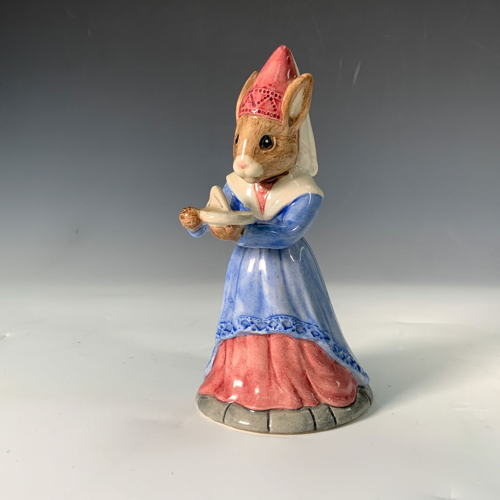 Royal Doulton Bunnykins Figurine, Sundial DB213: Presenting the Royal Doulton Bunnykins Sundial figurine, designated as DB213. Issued in the year 2000 as the Bunnykins Figure of the Year, this is the first in the Time Series. Designed by artist Mart