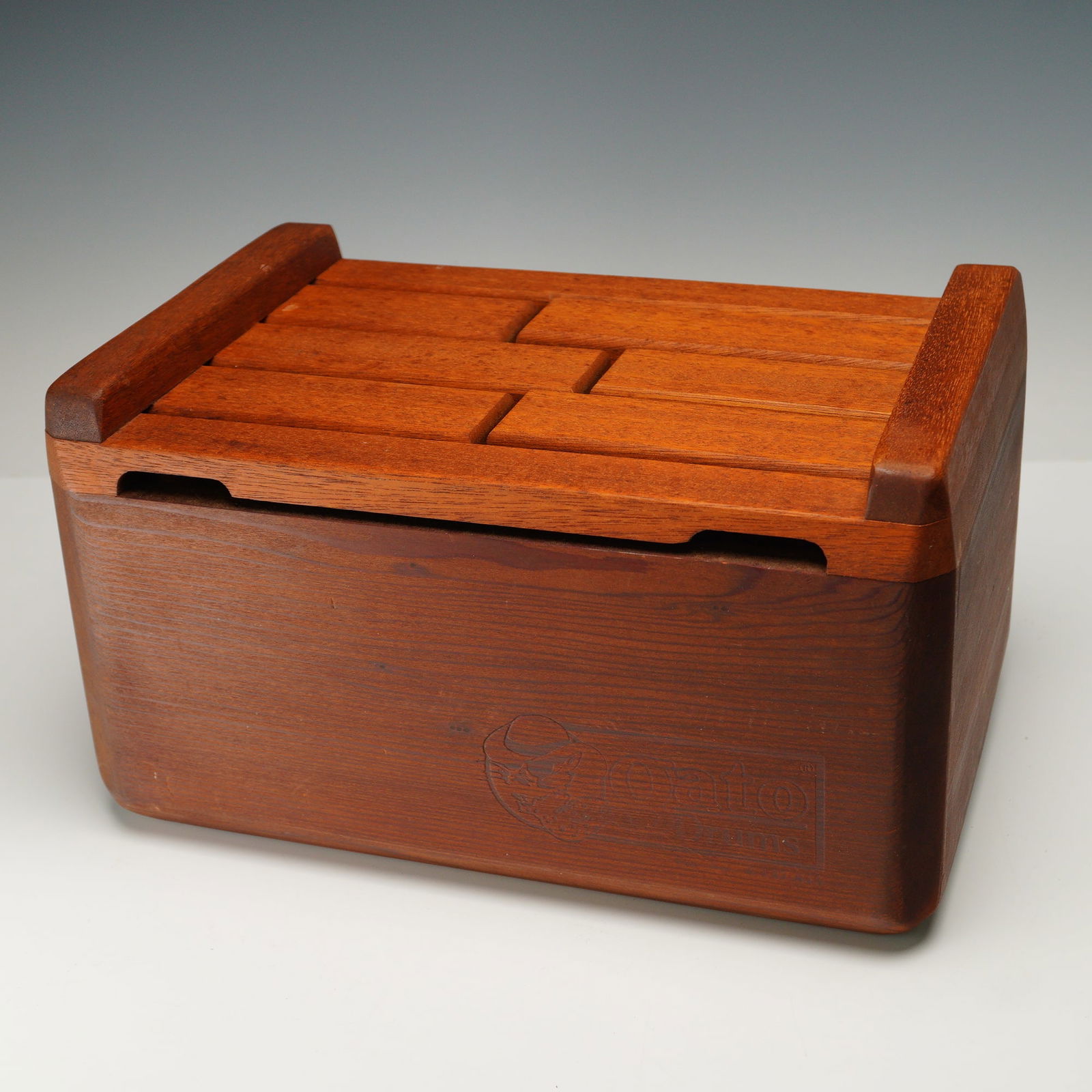 Gato Drums Wood Tongue Drum: A hand-crafted wooden tongue drum by Gato Drums, known for their unique percussion instruments that blend craftsmanship with resonant sound quality. Made from solid wood with a warm, natural finish, t