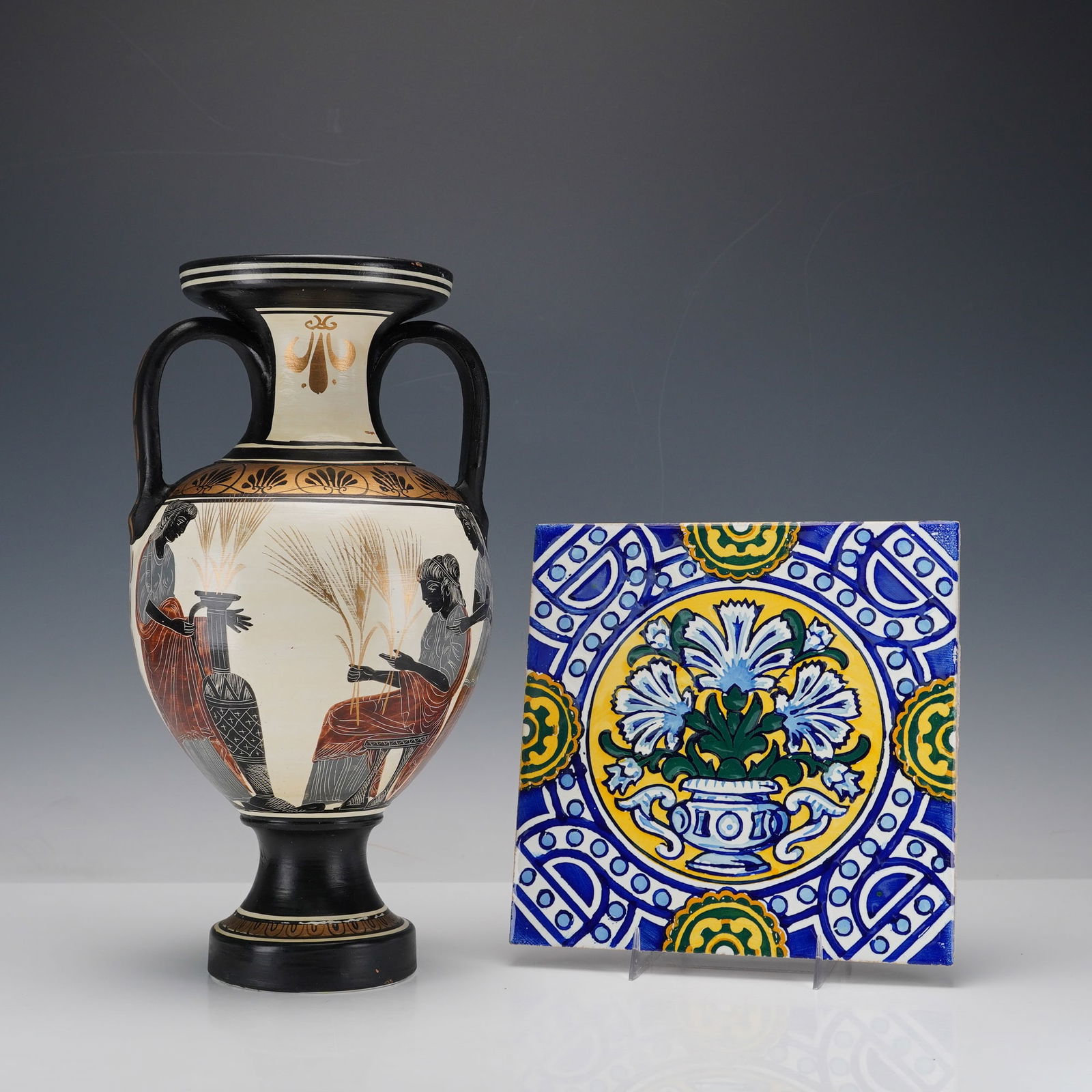 2pc Greek Hand-Painted Amphora Vase Depicting Demetra & Aphrodite with Tile: Decorative handcrafted pieces including a Greek amphora vase depicting Demetra and Aphrodite seated, and a colorful handmade ceramic tile. The amphora features hand-painted classical figural decoratio