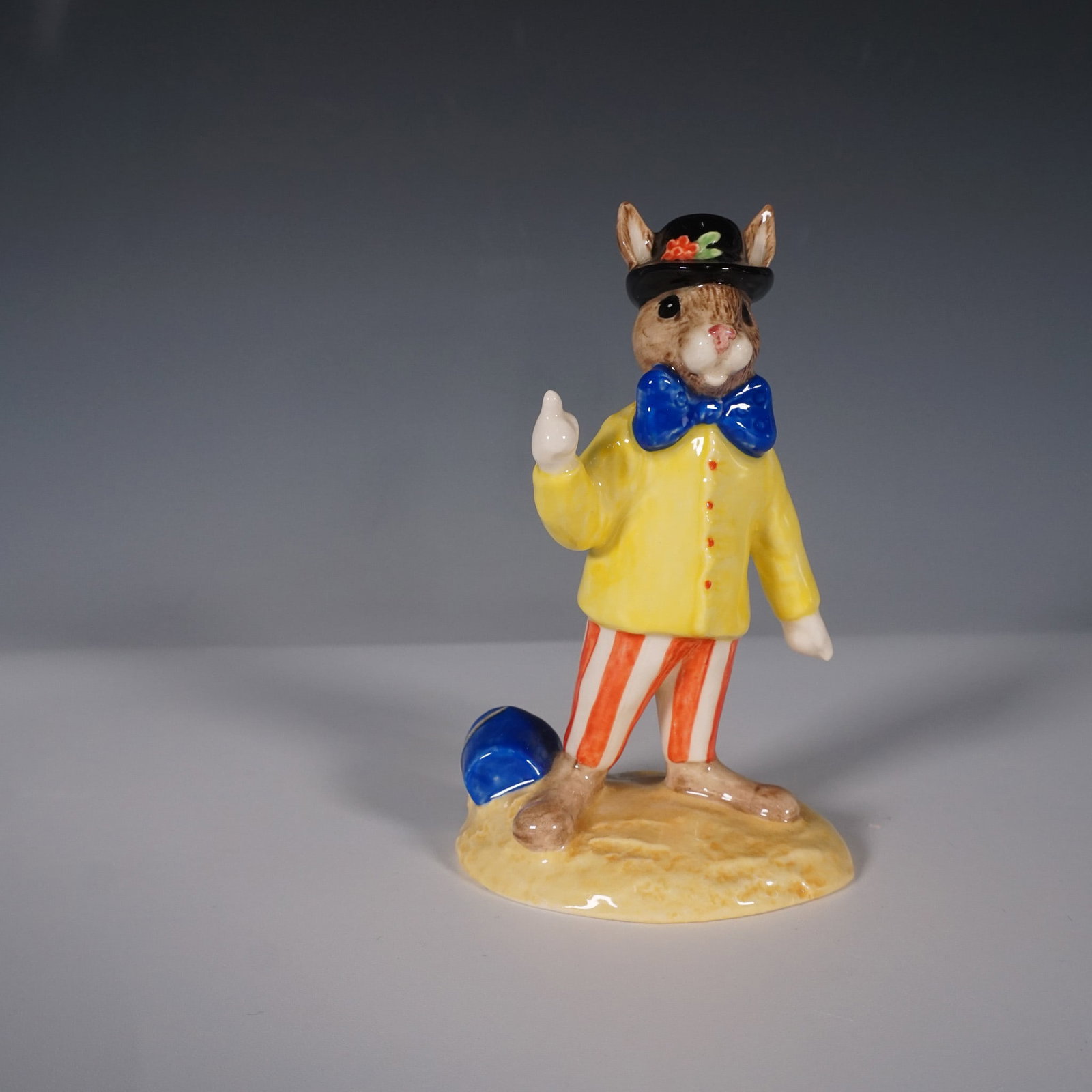 Royal Doulton Joker Bunnykins Figurine, DB171: This Joker Bunnykins figurine (DB171) by Royal Doulton is a limited edition of 2,500, produced exclusively for UK International Ceramics in 1997. The charming hand-painted porcelain figure features a 