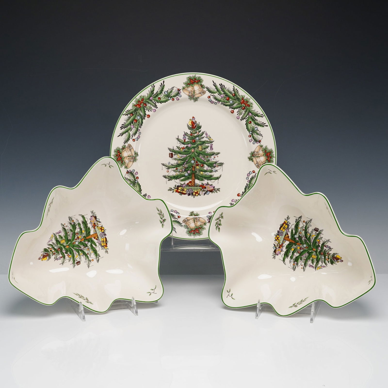 3pc Spode Christmas Tree and Garland Serveware Set: A 3-piece Spode serveware group featuring two tree-shaped bowls and one round buffet plate from the Christmas Tree and Christmas Tree Garland patterns. Each piece showcases Spode's classic holiday mot