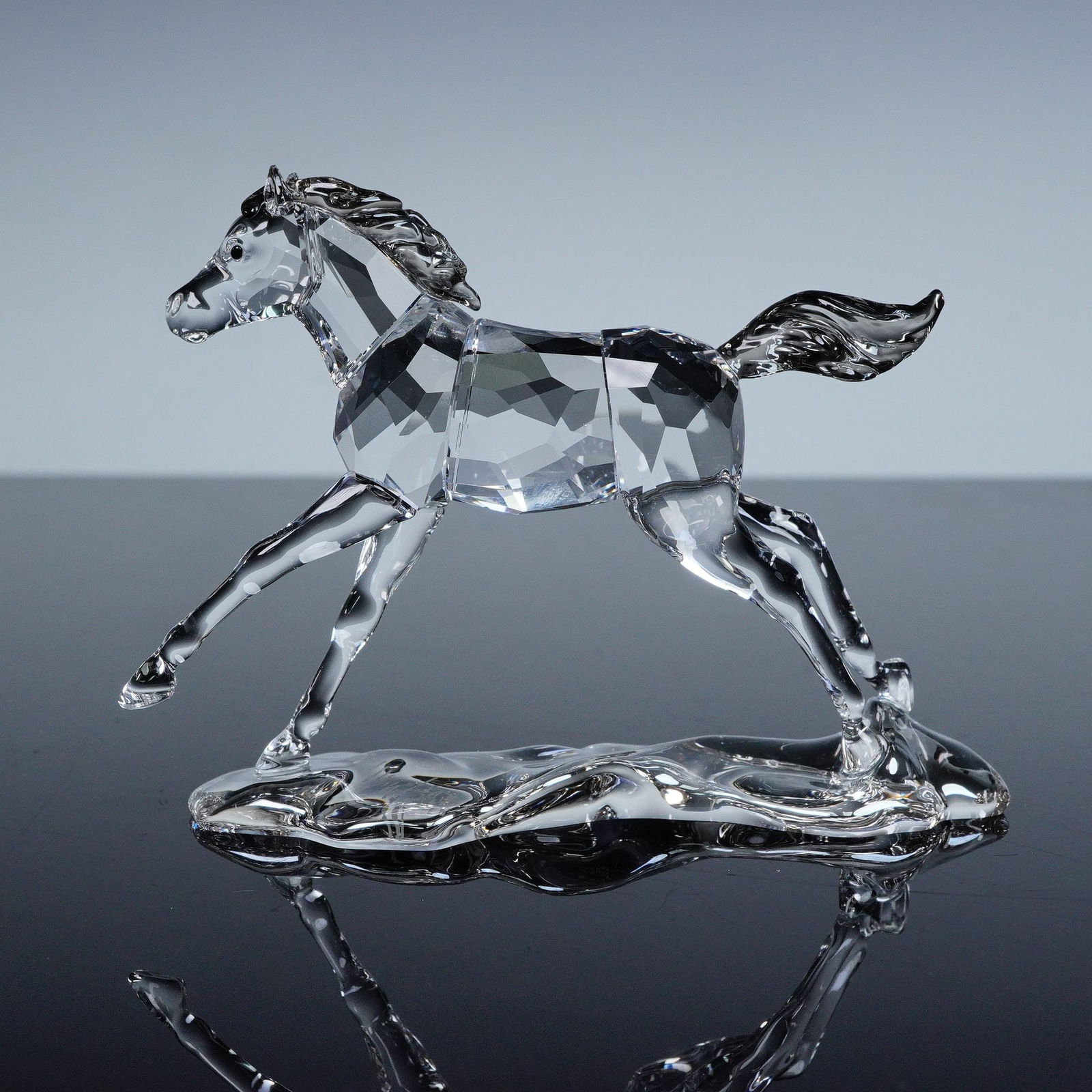 Swarovski Crystal Figurine, Foal: Swarovski 2014 Annual Edition Companion Foal 5004729 figurine crafted in clear crystal depicting a young horse, bearing the Swarovski backstamp and signed by the designer, includes original SCS box 5.